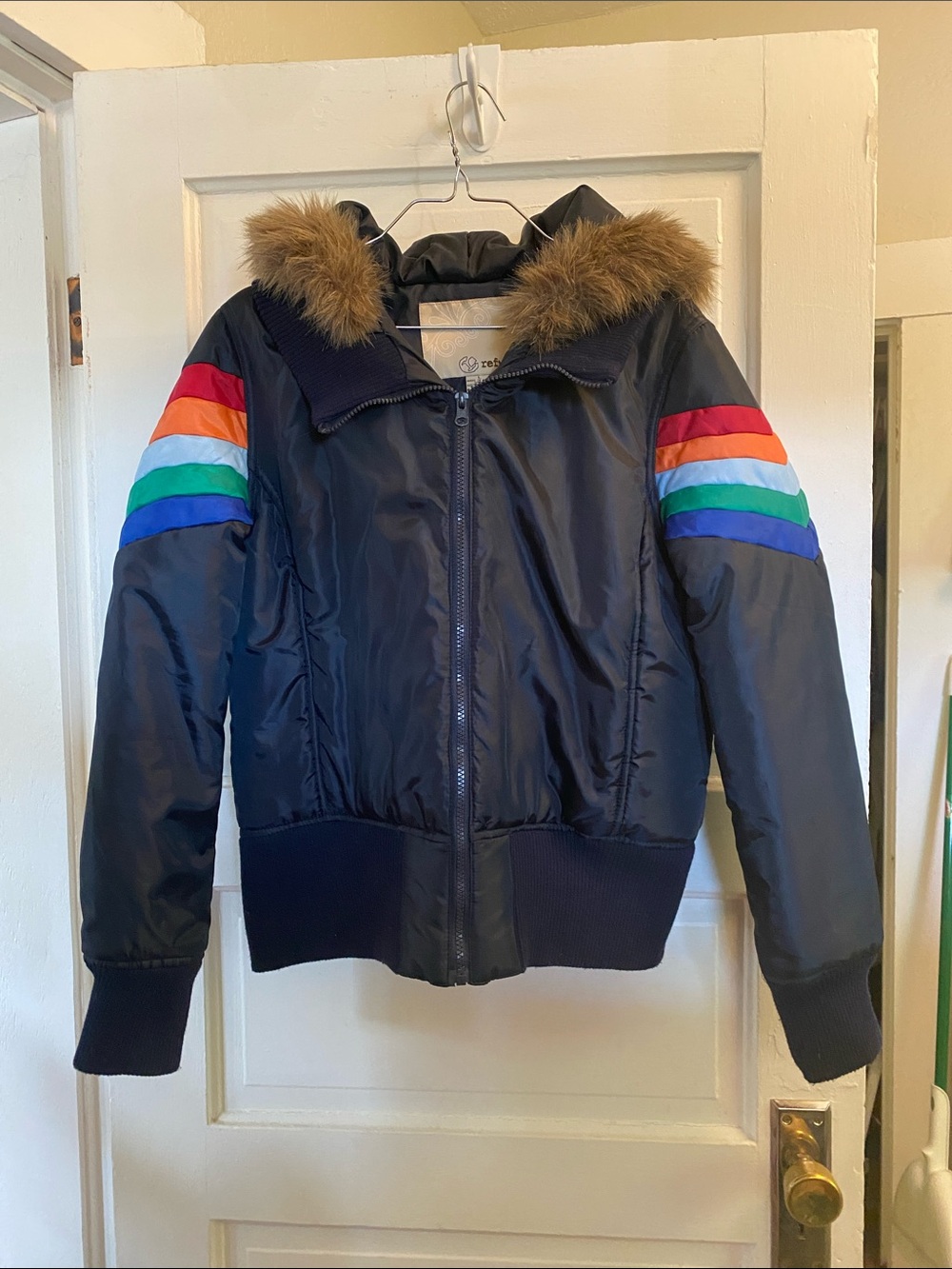 Navy Puffer Jacket with Rainbow Sleeve Stripes